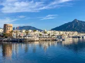 Yachts in Marbella marina at sunrise. 